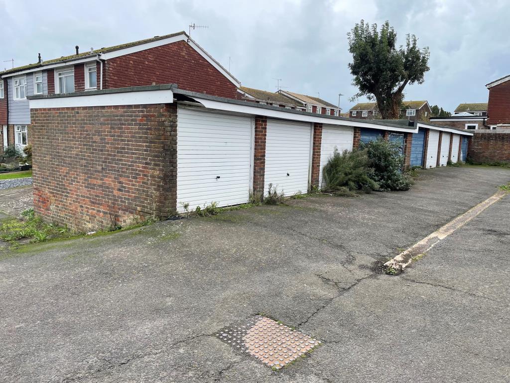 Lot: 98 - TWENTY-TWO LOCK-UP GARAGES IN A COMPOUND - Eastern block of ten garages